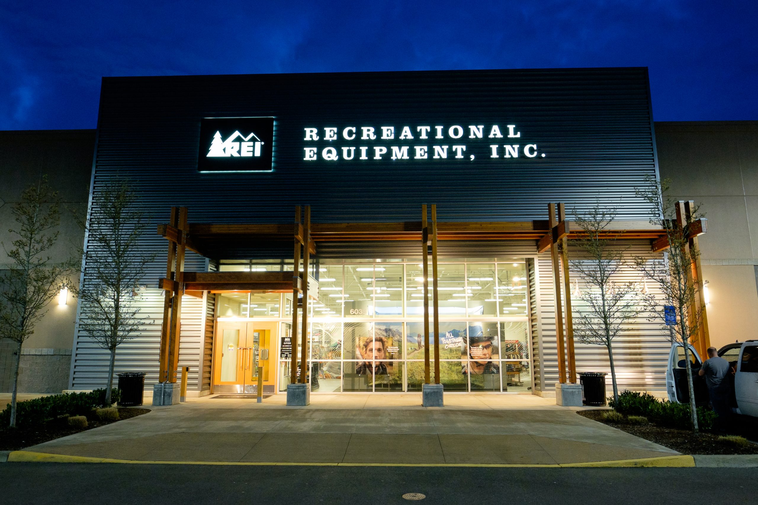 Workers boarding up the REI Flagship store in New York during the