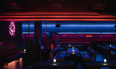 Pull Up a Chair and Bask in This Bar’s Purple Glow