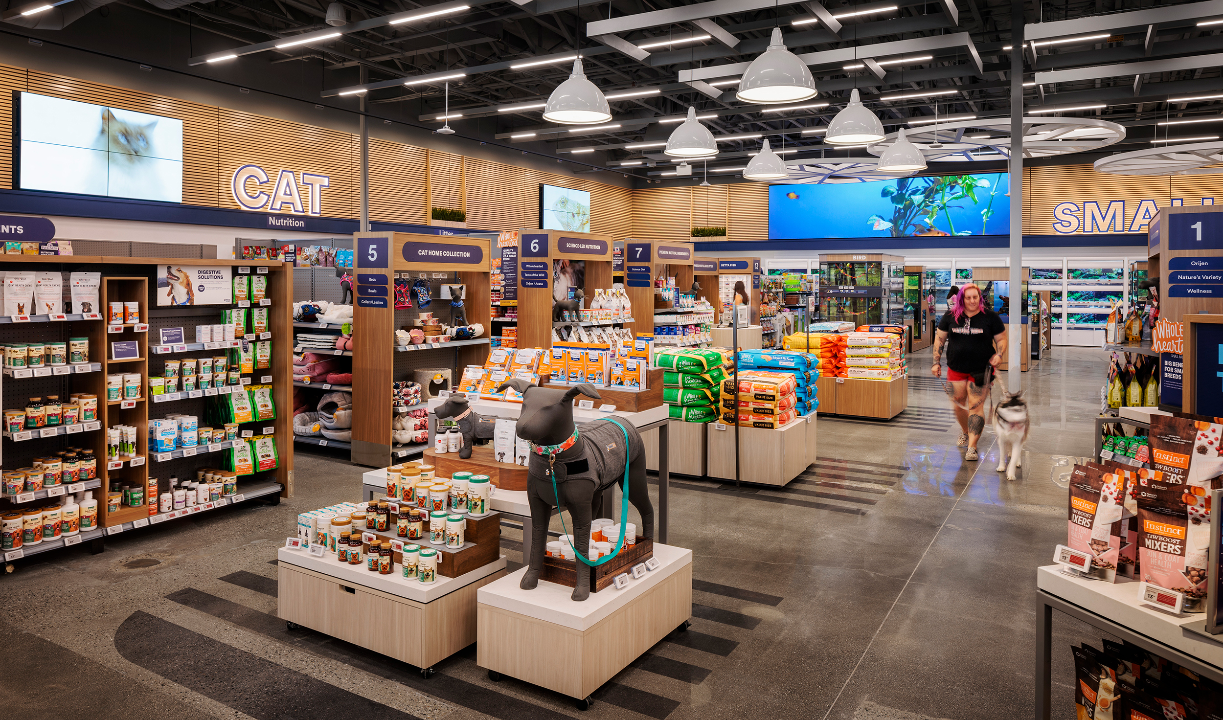 This page: Petco’s latest “next-generation store” aims to offer a personalized experience for customers through a seamless in-store journey.